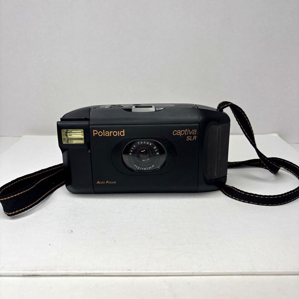 Vintage Polaroid Captiva SLR Instant Camera Auto Focus 95 Film w/ Strap Untested